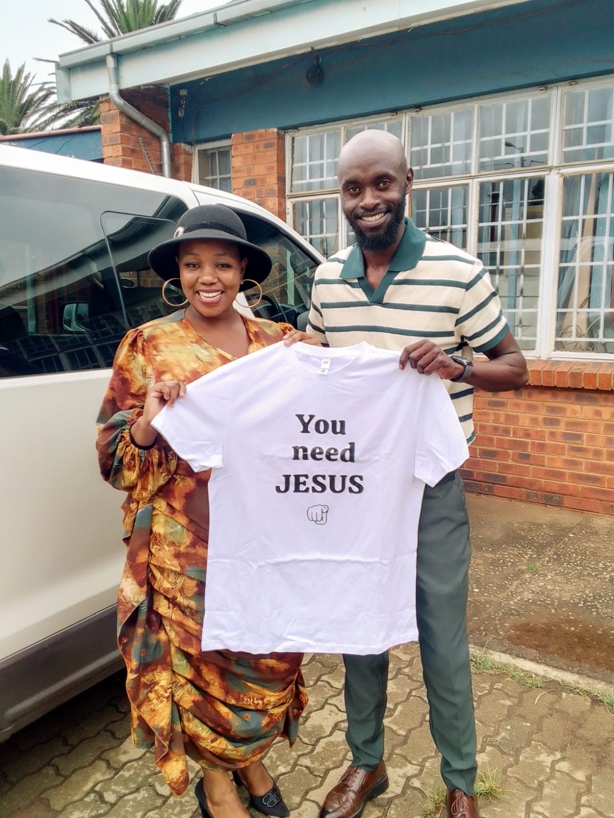 Customer holding hoodie