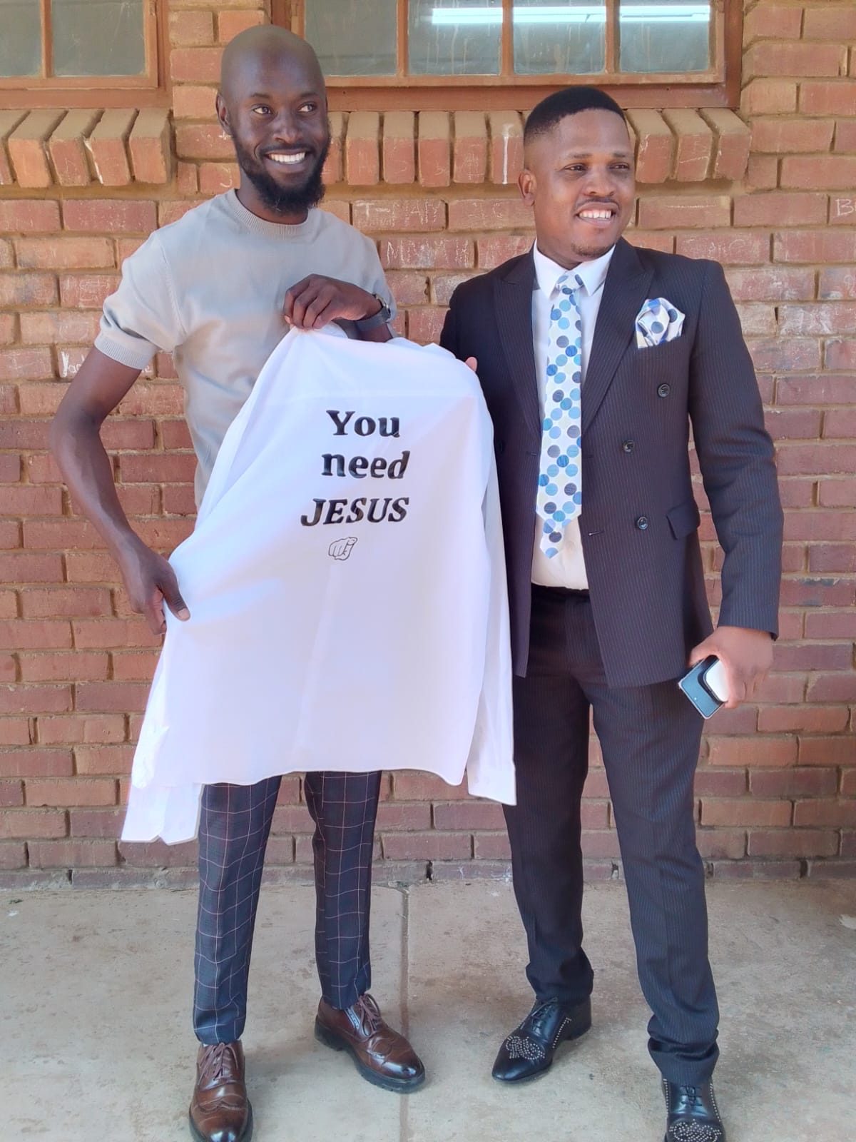 Customer wearing You need JESUS merch