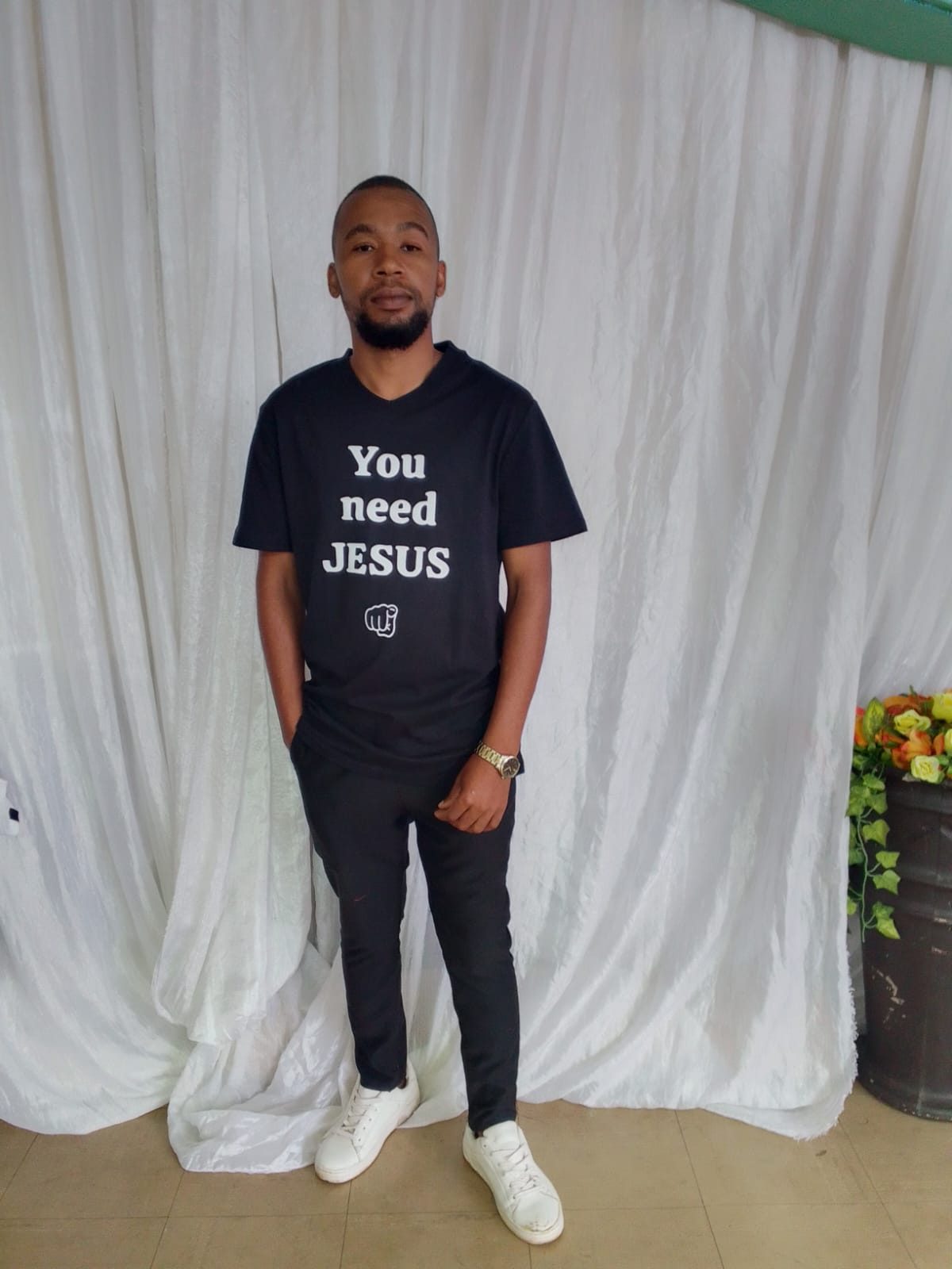 Customer wearing You need JESUS merch